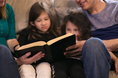 Family Reading the Bible together – Committed to Teaching and Preaching ...