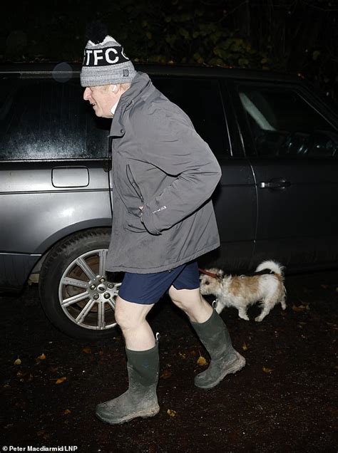 Why does Boris Johnson keep wearing a GTFC hat and what does it mean?