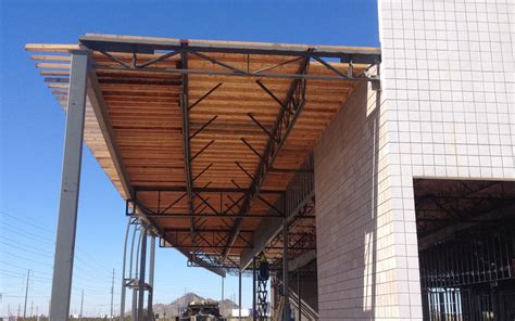 Understanding Commercial Flat Roof Systems - The Structures Group Southwest