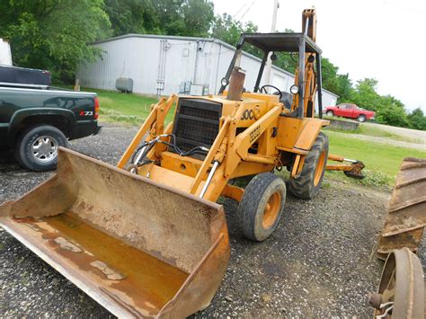 CASE 580C BACKHOE LOADER; OUTRIGGERS