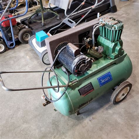 SEARS ROLLING AIR COMPRESSOR WITH NON STANDARD PLUG - Big Valley Auction