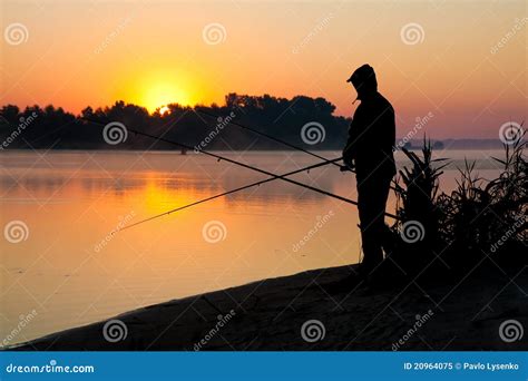 Silhouette Of Man Fishing In A Sunset Royalty Free Stock Photo - Image: 20964075