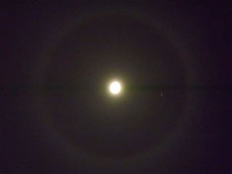 A 22° halo (known also as moon or solar halo) is an optical phenomenon, forming a circle with a ...