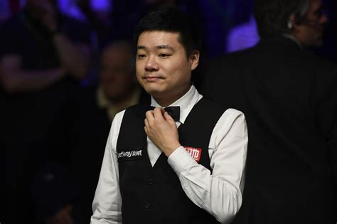 Ding wins through in deciding frame on day two of World Snooker Championship