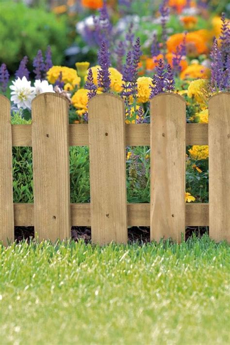 Picket Fence Edging in 2023 | Decorative garden fencing, Fence landscaping, Beautiful home gardens