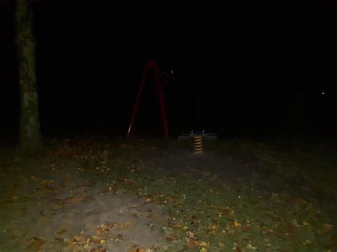 Playground at night. Looks scarier without the light, but my phone ...