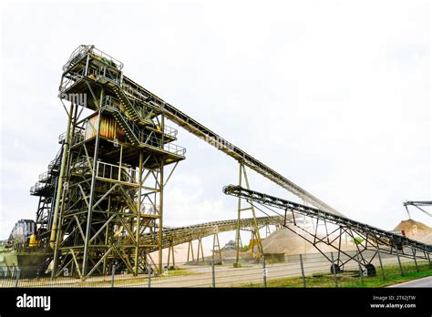 Sand and gravel conveyor system. Industrial machine for conveying goods Stock Photo - Alamy