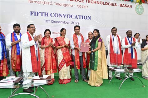 Telangana Minister KTR distributes laptops to IIIT Basara students