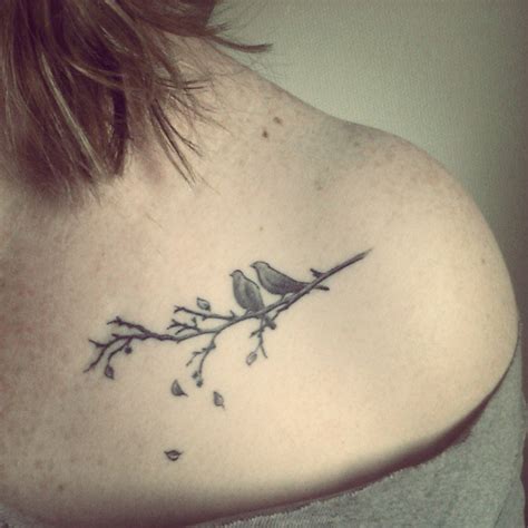 Adorable birds on a branch tattoo