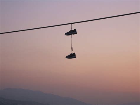 Free Shoes hanging from power line Stock Photo - FreeImages.com