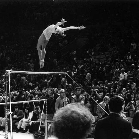 Photo captures gymnast Olga Korbut in a backwards flip off the bars. Photo dated: December 12 ...