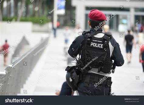 117 Singapore Police Uniform Images, Stock Photos & Vectors | Shutterstock