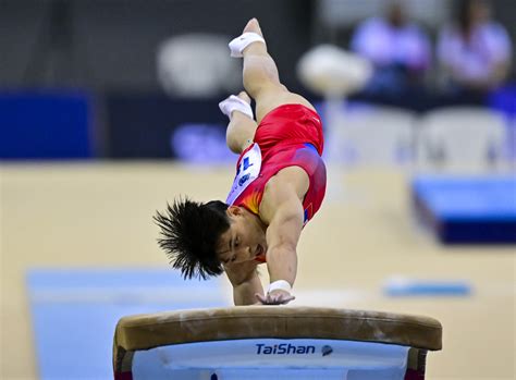 Carlos Yulo wins two more golds in vault, parallel bars at Asian ...