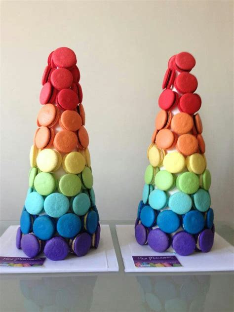 there are two colorful rocks stacked on top of each other in the shape of a pyramid