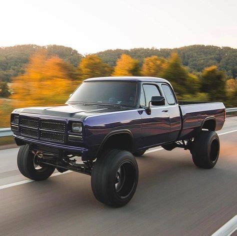 Black Lifted Old Body Dodge First Gen Cummins with Big Mud Tires and Chrome Stack ...