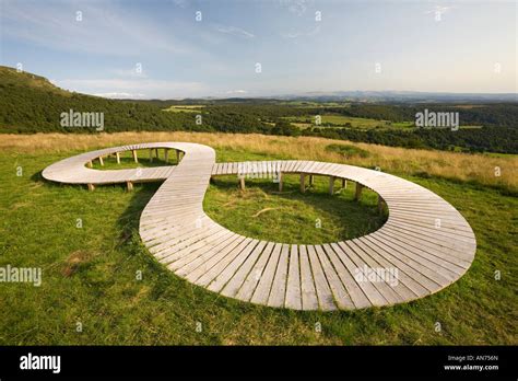 Land Art in a meadow (Puy de Dôme - France). Lemniscate sculpture ...