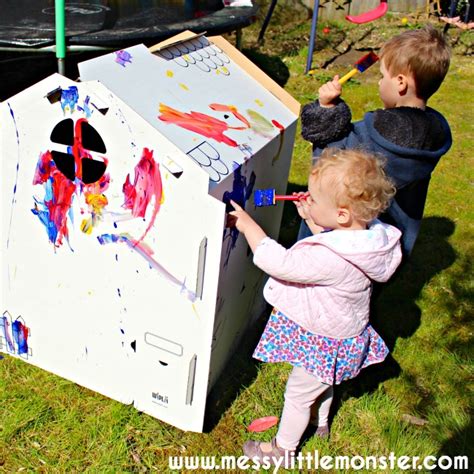 Painted Cardboard Playhouse - fun messy art for kids! - Messy Little ...