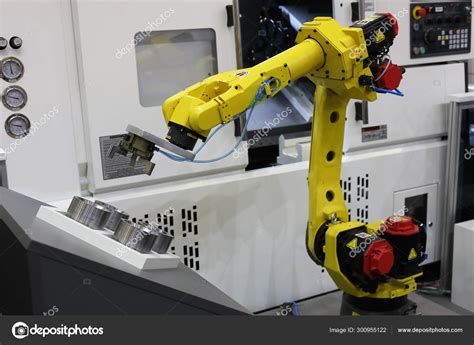 Automated CNC machine loading with robotic arm — Stock Photo © genkur #300955122