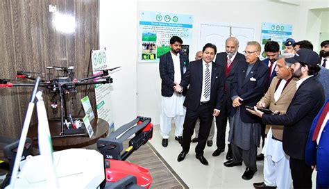 President Dr. Arif Alvi being briefed about Precision Agriculture Technologies, at the Pir Mehr ...