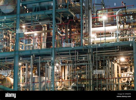 Industrial complex working at night Stock Photo - Alamy