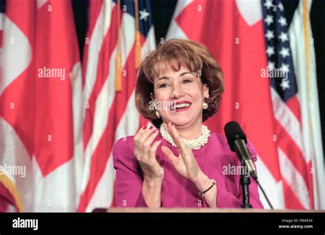 Elizabeth Dole, President of the American Red Cross, smiles as she ...