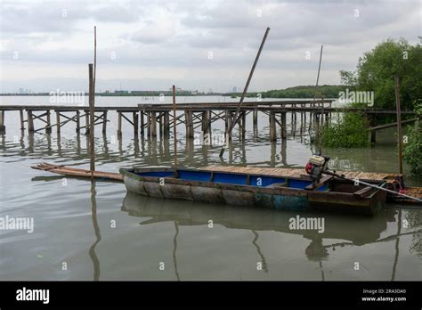 Traditional wooden fishing boat with motor in Indonesia Stock Photo - Alamy