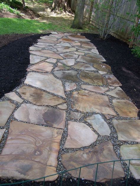 irregular natural stone permeable patio with pea gravel joints | Sustainable Installs ...