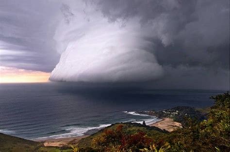 The Weather Calendar ... July: A squall associated with a thunderstorm over Era Beach, south of ...