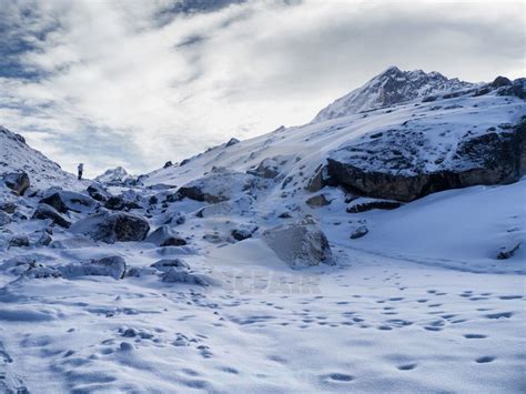 Lone Trekker in Thick Mountain Snow (Himalayas) at Picfair.com | Snow ...