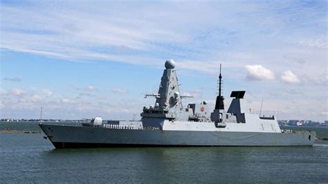 UK denies Russia fired warning shots at British warship near Crimea ...