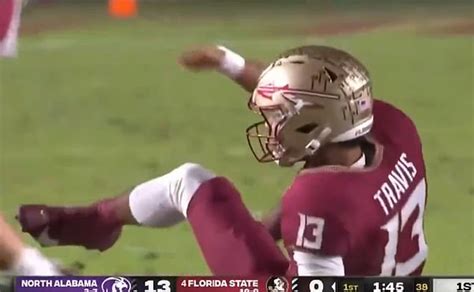 Florida State quarterback Jordan Travis carted off the field with GRUESOME leg injury via a hip ...