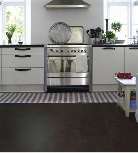 Dark Cork Flooring in a Kitchen Cork is an amazing flooring option on the market today. Cork can ...