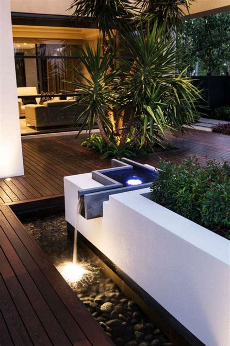 modern-garden-fountains-in-small-backyard-deck | HomeMydesign