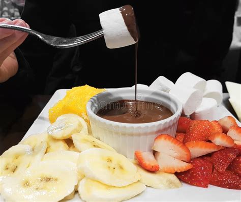 Fondue with Hot Chocolate and Fresh Fruit Stock Photo - Image of drop ...