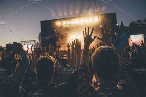 Crowd puts hands up at festival | Summer music festivals, Summer music ...