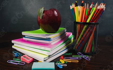 Back to School Concept with Stationery and Blackboard, on wooden ...