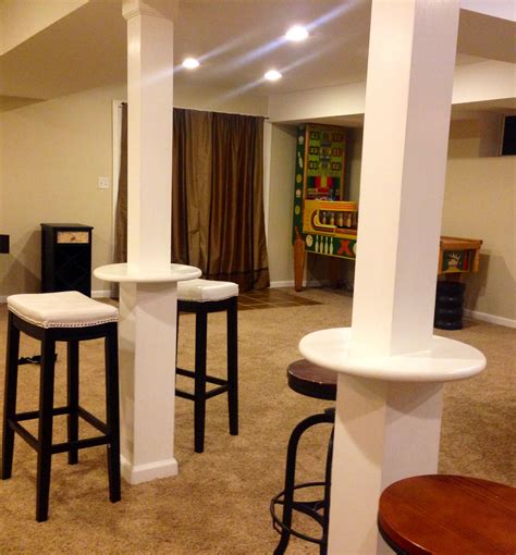 Great use of support beams in a finished basement | Game room basement, Finishing basement ...