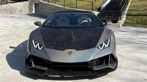 Which exotic cars does controversial internet personality Andrew Tate own?