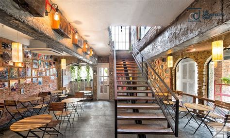 Unconventional Cafe Interior Adding Rustic Flavor To Space | Praveen Architects - The Architects ...