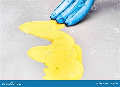 Painting with Brush Blue Banana in Yellow Paint. Concept Design ...