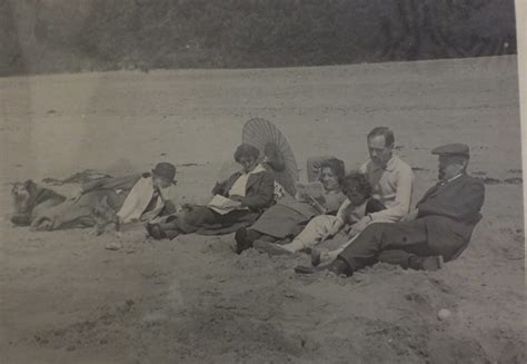 Family enjoying Mumbles Beach - The Story of Mumbles