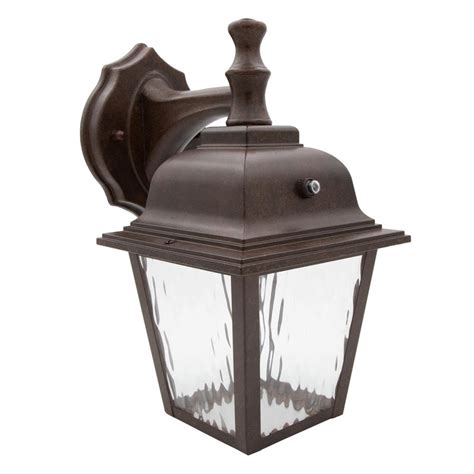 Maxxima LED Porch Lantern Outdoor Wall Light, Aged Bronze w/ Clear Water Glass, Dusk to Dawn ...