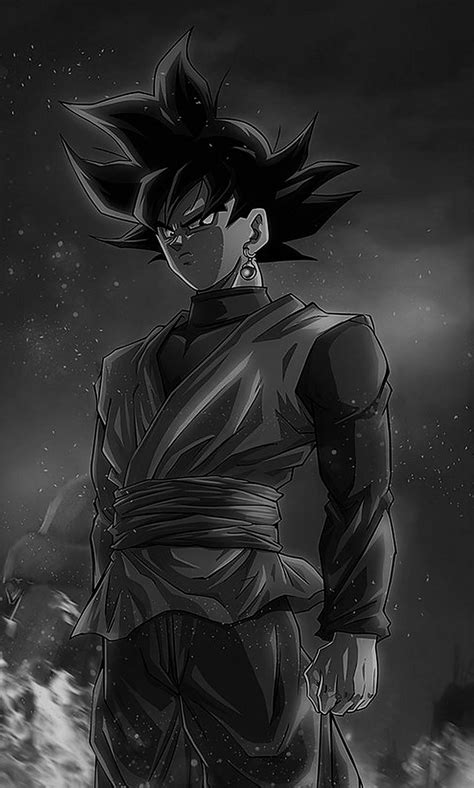 Download "Goku's Epic Transformation from Black to White" Wallpaper | Wallpapers.com