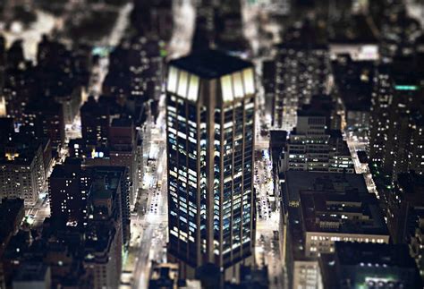 Aerial View Of New York City At Night by Michael Duva