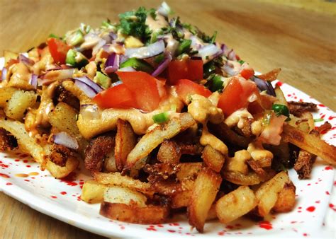 Loaded Fries with Cashew Cheese Sauce, Fresh Toppings, and Chipotle Mayo | Vegan Food Lover