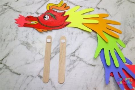 Handprint Dragon Puppet | Chinese New Year Craft - Crafts By Ria