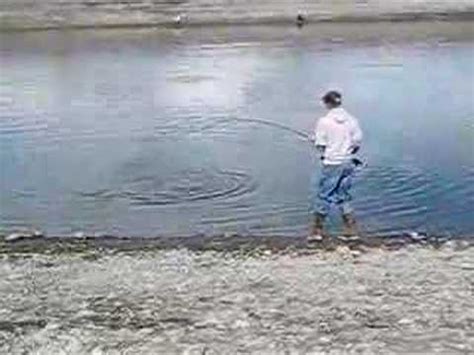 Homer Spit Fishing Hole Action - YouTube