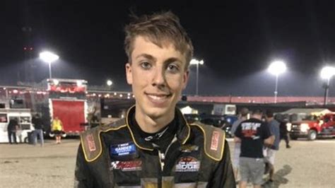 Portage native dodges crash, earns first NASCAR win in double overtime