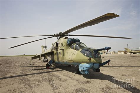 An Mi-35 Attack Helicopter At Kunduz Photograph by Terry Moore - Pixels