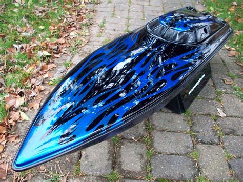 Black with custom blue flames | Gas rc boats, Rc boats, Offshore boats